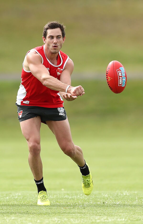 AFL 2018 Training - Sydney Swans 261118 SYDNEY, AUSTRALIA - NOVEMBER 26: Dan Menzel handballs during a Sydney Swans AFL training session at Bat & Ball Oval on November 26, 2018 in Sydney, Australia. (Photo by Mark Metcalfe/Getty Images/AFL Media)